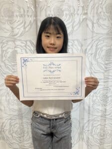 英語スピーチコンテスト,英語力が未来を切り開く！Aikoさん、スピーチコンテストで見事優勝！